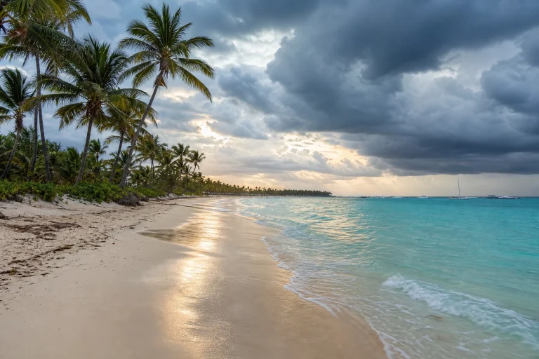 Punta Cana beach under mixed sun and rain clouds in fall