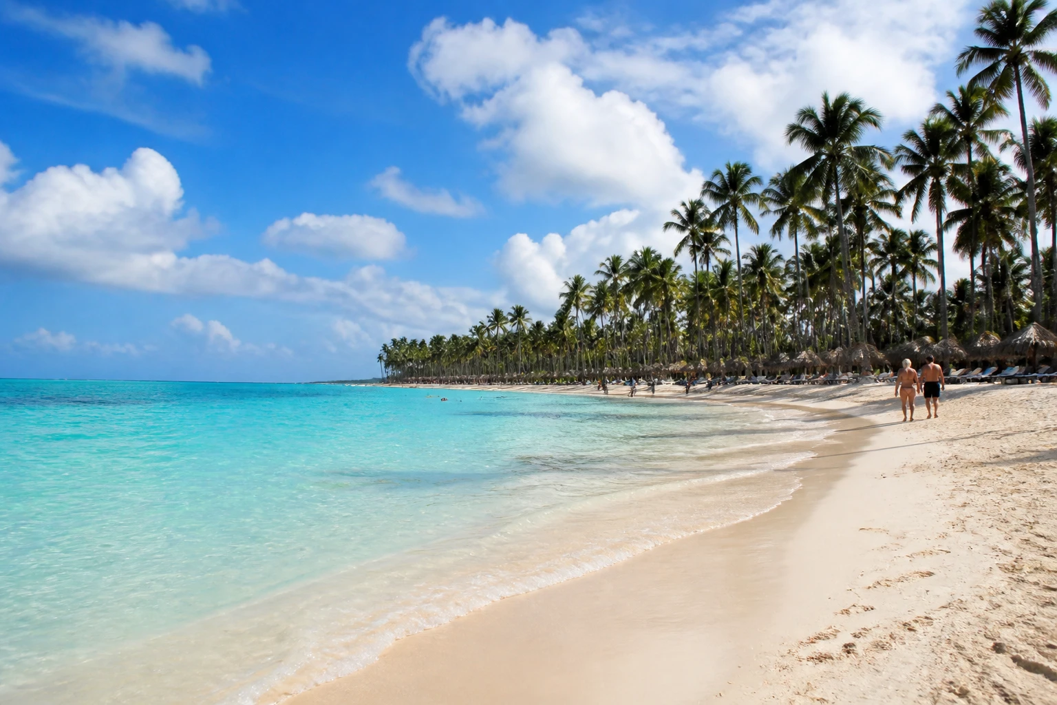 Palm-lined Punta Cana beach on a warm summer morning